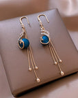 Festive Earrings with Blue Beads