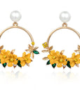 Flower and Pearl Earrings in Gold