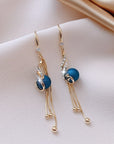 Festive Earrings with Blue Beads