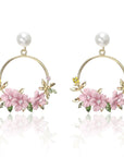 Flower and Pearl Earrings in Gold