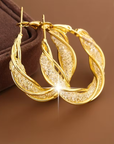 Elegant Bright Hollow Twisted Earrings