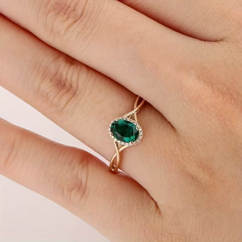 Emerald Twist Ring