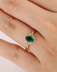 Emerald Twist Ring