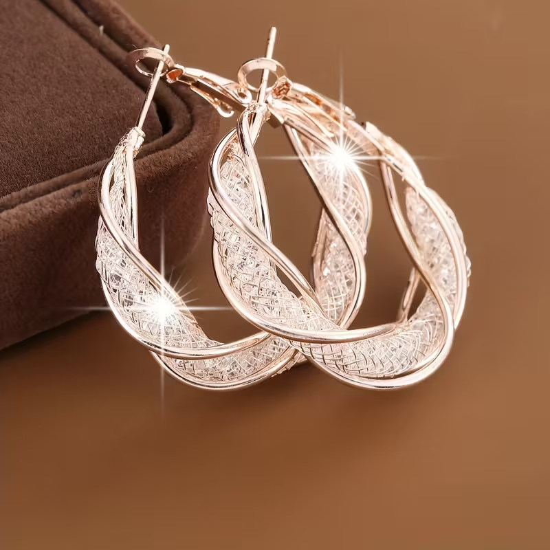 Elegant Bright Hollow Twisted Earrings