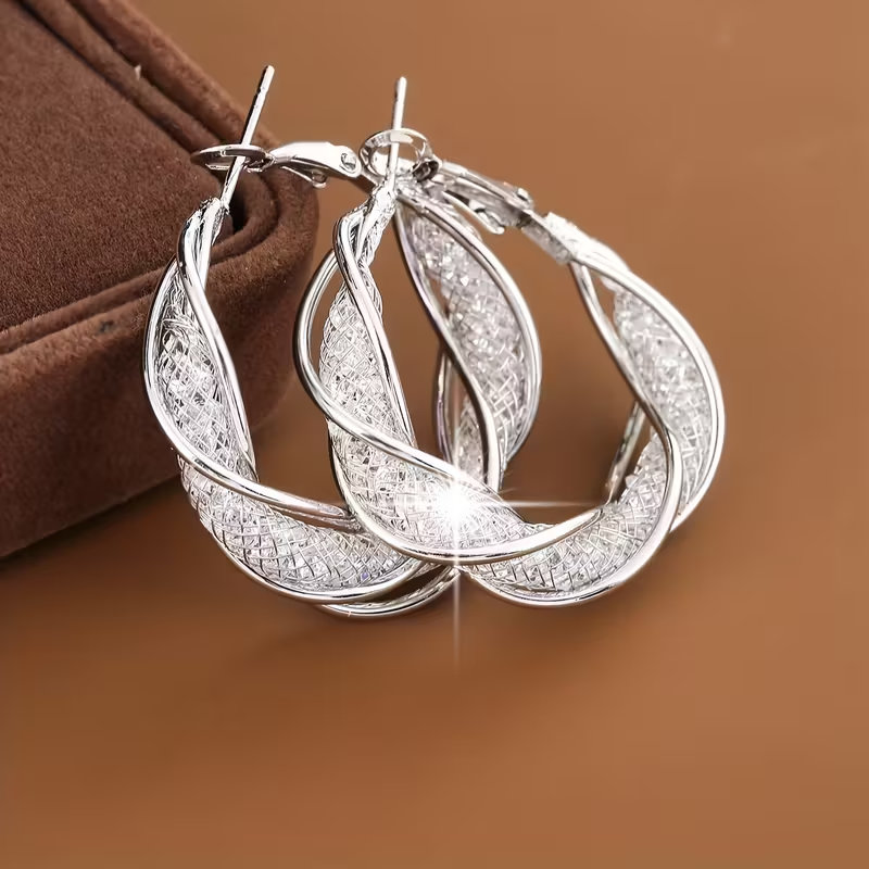 Elegant Bright Hollow Twisted Earrings