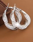 Elegant Bright Hollow Twisted Earrings